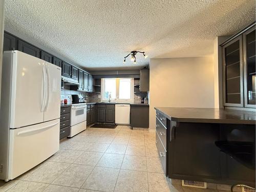 3802 56 B Avenue, Lloydminster, AB - Indoor Photo Showing Living Room With Fireplace