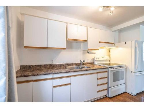 5105 54A Street, Lloydminster, AB - Indoor Photo Showing Kitchen With Double Sink