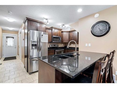 7-5118 34 Street, Lloydminster, AB - Indoor Photo Showing Kitchen With Double Sink With Upgraded Kitchen