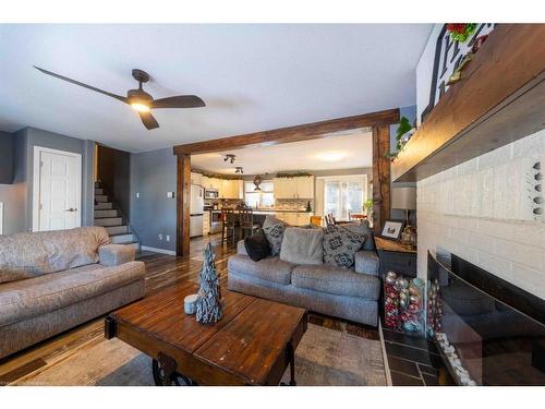 2304 46A Avenue, Lloydminster, SK - Indoor Photo Showing Living Room With Fireplace