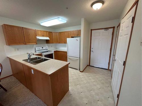 103-5120 51 Avenue, Vermilion, AB - Indoor Photo Showing Kitchen With Double Sink