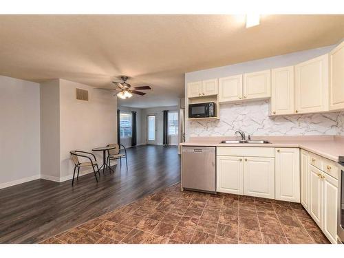 104-5102 47 Street, Lloydminster, AB - Indoor Photo Showing Kitchen With Double Sink