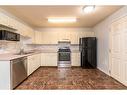 104-5102 47 Street, Lloydminster, AB  - Indoor Photo Showing Kitchen With Double Sink 