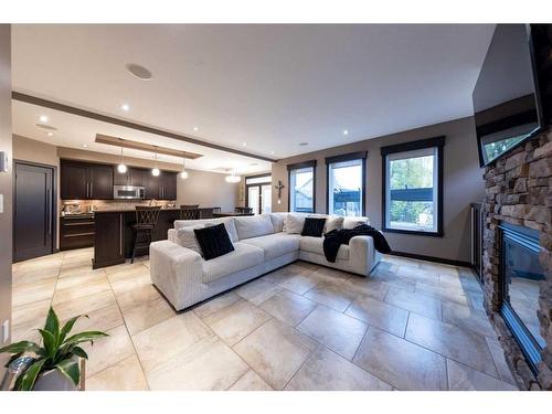 1604 52B Avenue Close, Lloydminster, AB - Indoor Photo Showing Living Room With Fireplace