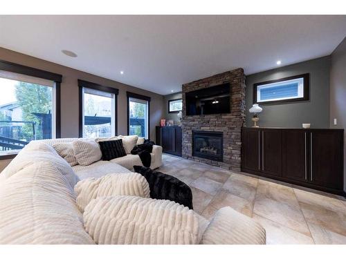 1604 52B Avenue Close, Lloydminster, AB - Indoor Photo Showing Living Room With Fireplace