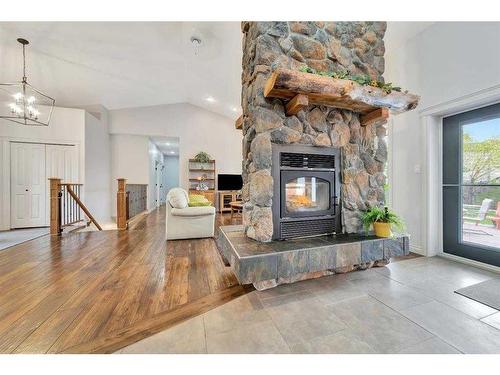 1117 26 Street West, Wainwright, AB - Indoor Photo Showing Living Room With Fireplace