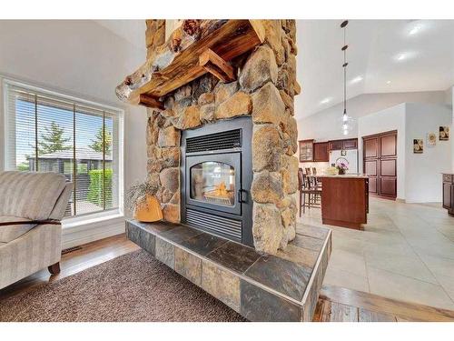 1117 26 Street West, Wainwright, AB - Indoor Photo Showing Living Room With Fireplace