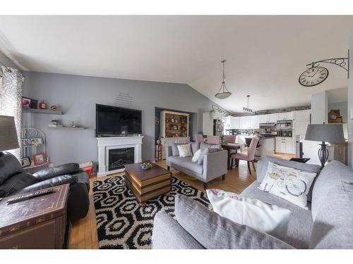 2109 52 Avenue, Lloydminster, AB - Indoor Photo Showing Living Room With Fireplace