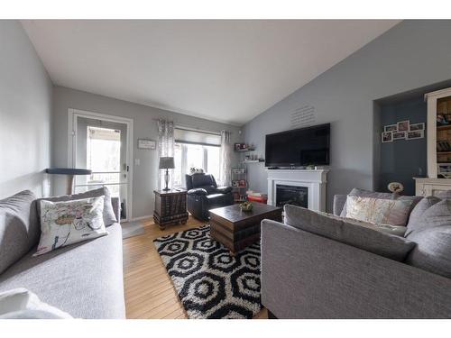 2109 52 Avenue, Lloydminster, AB - Indoor Photo Showing Living Room With Fireplace