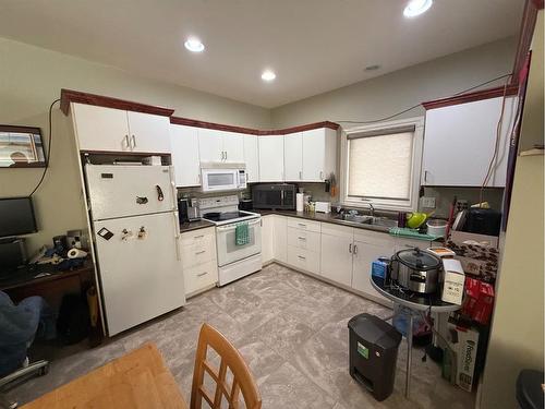 100 Rose Meadow Drive, Loon Lake, SK - Indoor Photo Showing Kitchen With Double Sink