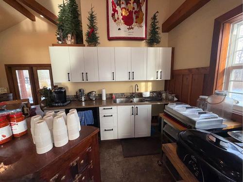 100 Rose Meadow Drive, Loon Lake, SK - Indoor Photo Showing Kitchen With Double Sink