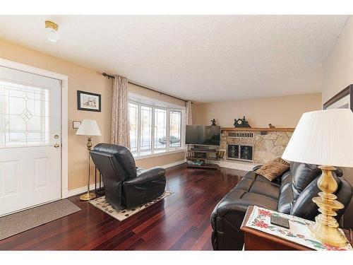 3619 50 Avenue, Lloydminster, SK - Indoor Photo Showing Living Room With Fireplace