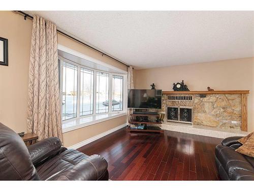 3619 50 Avenue, Lloydminster, SK - Indoor Photo Showing Living Room With Fireplace