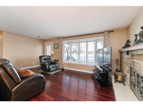 3619 50 Avenue, Lloydminster, SK - Indoor Photo Showing Living Room With Fireplace