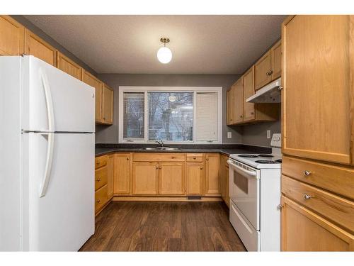 5306 47 Street, Lloydminster, AB - Indoor Photo Showing Kitchen With Double Sink