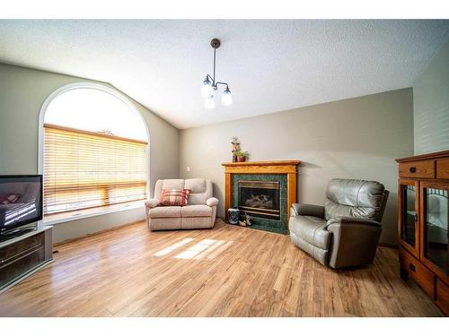 5529 41 Street, Provost, AB - Indoor Photo Showing Living Room With Fireplace