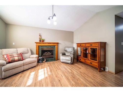 5529 41 Street, Provost, AB - Indoor Photo Showing Living Room With Fireplace