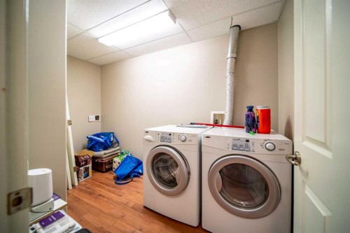210-2609 11 Avenue, Wainwright, AB - Indoor Photo Showing Laundry Room
