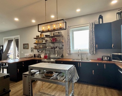 34062 Hwy 13, Provost, AB - Indoor Photo Showing Kitchen With Double Sink