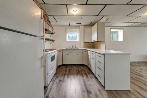 201 3 Avenue E, Neilburg, SK - Indoor Photo Showing Kitchen With Double Sink