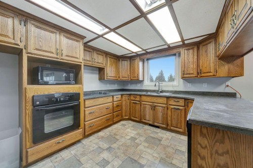 201 3 Avenue E, Neilburg, SK - Indoor Photo Showing Kitchen With Double Sink
