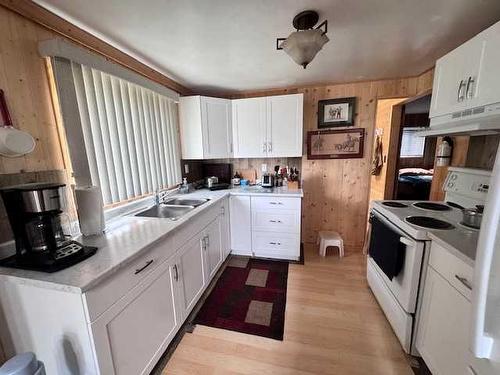 12 Suffern Lake, Suffern Lake, SK - Indoor Photo Showing Kitchen With Double Sink