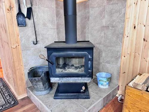 12 Suffern Lake, Suffern Lake, SK - Indoor Photo Showing Living Room With Fireplace