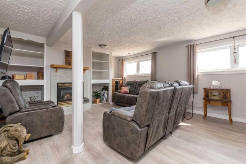326506 Twp Rd 500A, Rural, SK - Indoor Photo Showing Living Room With Fireplace
