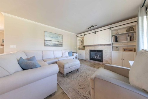 Ne-32-49-25-W3, Rural, SK - Indoor Photo Showing Living Room With Fireplace