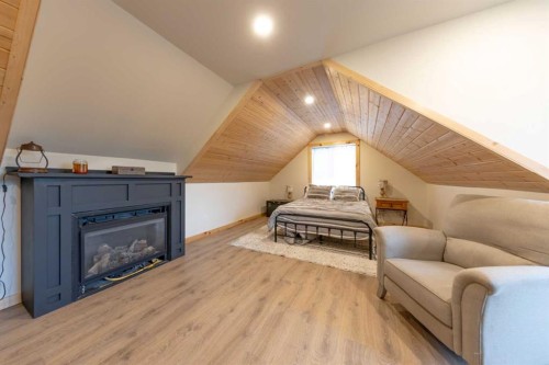 Ne-32-49-25-W3, Rural, SK - Indoor Photo Showing Living Room With Fireplace