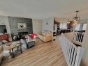1134 21 Street, Wainwright, AB  - Indoor Photo Showing Living Room With Fireplace 