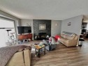 1134 21 Street, Wainwright, AB  - Indoor Photo Showing Living Room With Fireplace 