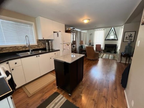 1304 Sand Place, Brightsand Lake, SK - Indoor Photo Showing Kitchen With Double Sink