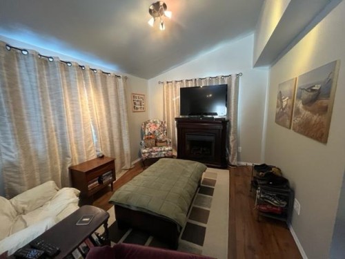 1304 Sand Place, Brightsand Lake, SK - Indoor With Fireplace