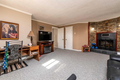 310 1 Street East, Marshall, SK - Indoor Photo Showing Living Room With Fireplace