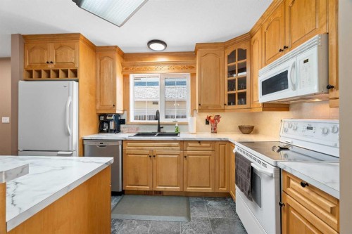 5303 23 Street, Lloydminster, AB - Indoor Photo Showing Kitchen With Double Sink