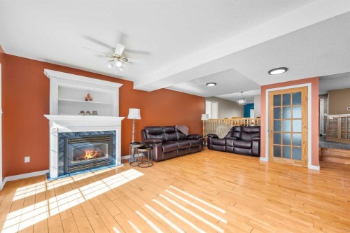 5303 23 Street, Lloydminster, AB - Indoor Photo Showing Living Room With Fireplace