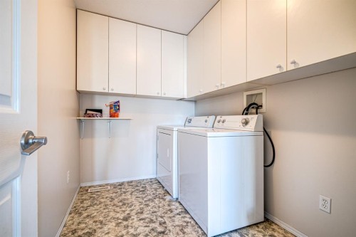 4845 50 Avenue, Kitscoty, AB - Indoor Photo Showing Laundry Room
