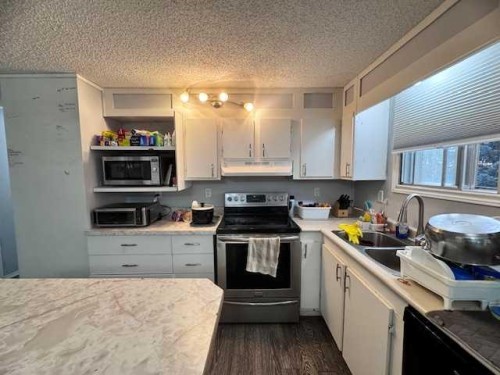 32384 Hwy 16, Rural, SK - Indoor Photo Showing Kitchen With Double Sink