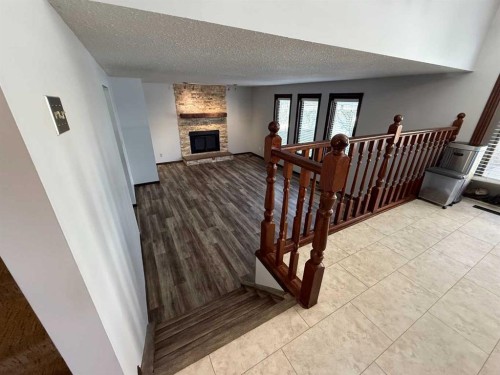 5520 41 Street, Provost, AB - Indoor Photo Showing Other Room With Fireplace