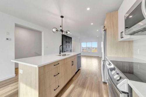 19-3616 41 B Avenue, Lloydminster, SK - Indoor Photo Showing Kitchen With Double Sink