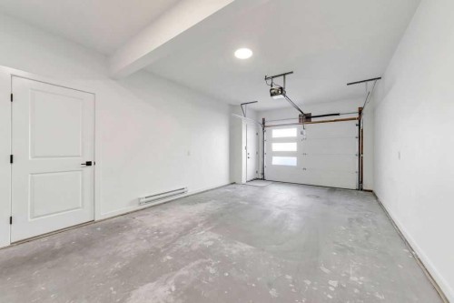 19-3616 41 B Avenue, Lloydminster, SK - Indoor Photo Showing Garage