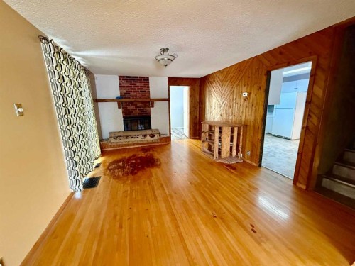 5107 47 Street, Provost, AB - Indoor With Fireplace
