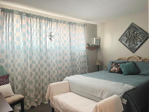 100-305 5 Street, Wainwright, AB - Indoor Photo Showing Bedroom