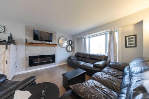 3805 58 Avenue, Lloydminster, AB - Indoor Photo Showing Living Room With Fireplace