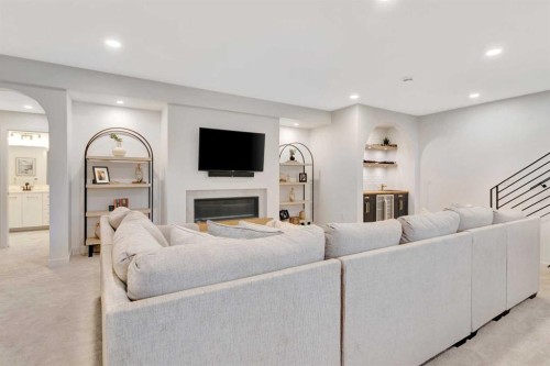 1302 59B Avenue, Lloydminster, AB - Indoor Photo Showing Living Room With Fireplace