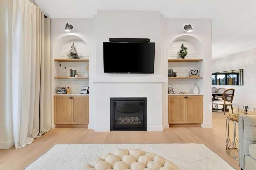 1302 59B Avenue, Lloydminster, AB - Indoor Photo Showing Living Room With Fireplace