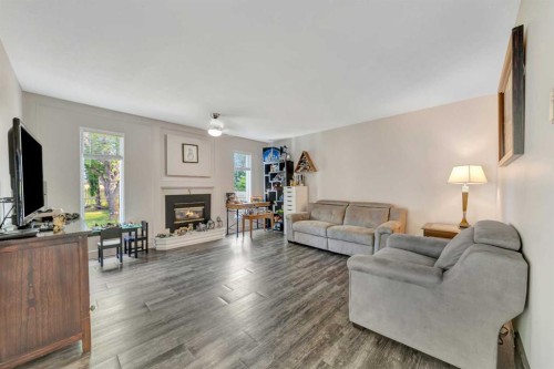 5201 26 Street, Lloydminster, AB - Indoor Photo Showing Living Room With Fireplace