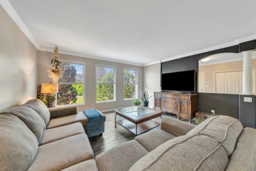 5201 26 Street, Lloydminster, AB - Indoor Photo Showing Living Room With Fireplace
