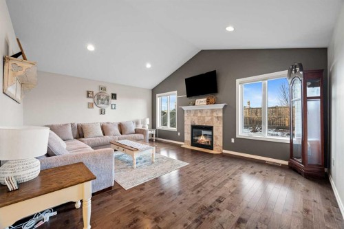 2102 58A Avenue Close, Lloydminster, AB - Indoor Photo Showing Living Room With Fireplace
